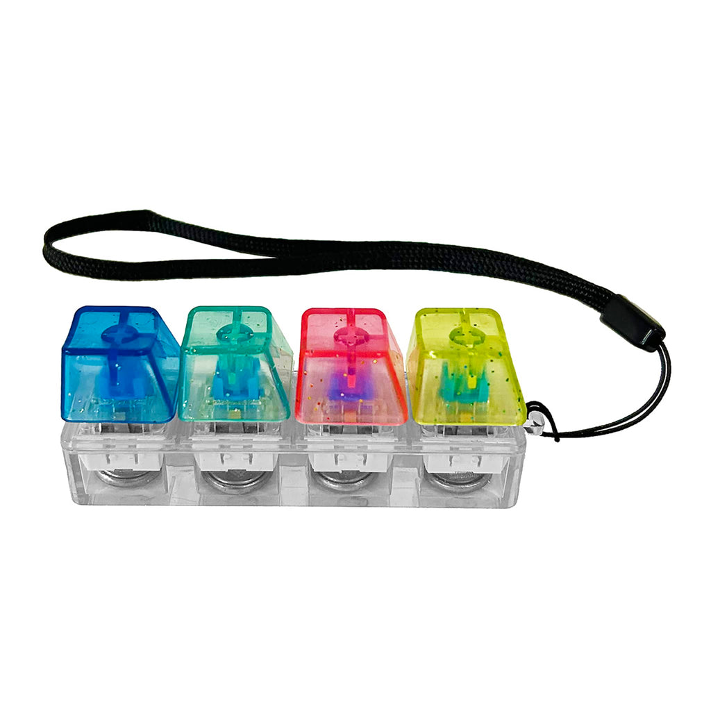 Four colorful keyboard keys in a row in a clear holder with a black lanyard on a white background.