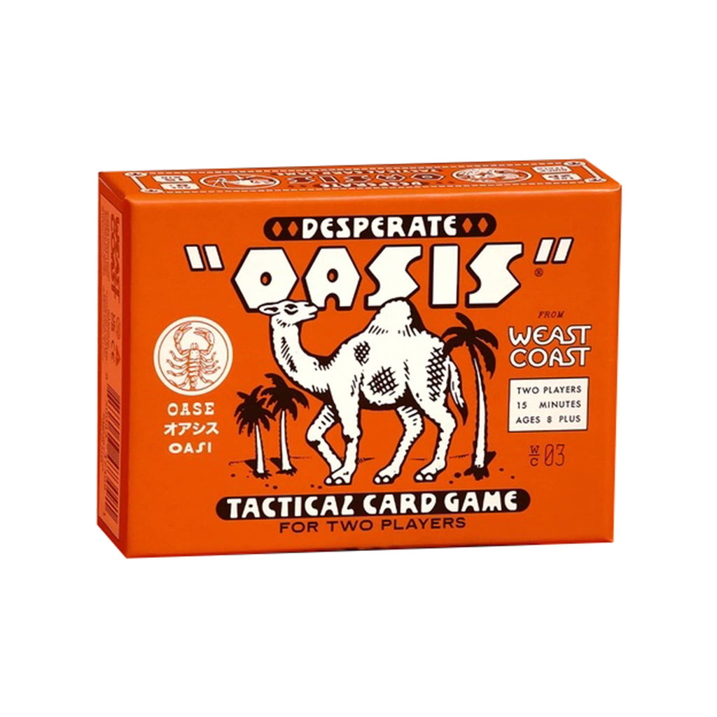 Desperate Oasis Tactical Card Game box with a camel and palm tree design on an orange background, front of box on a white background.