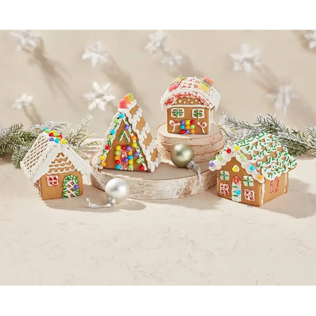 Wilton ready to build gingerbread mini village kit set up in scene.