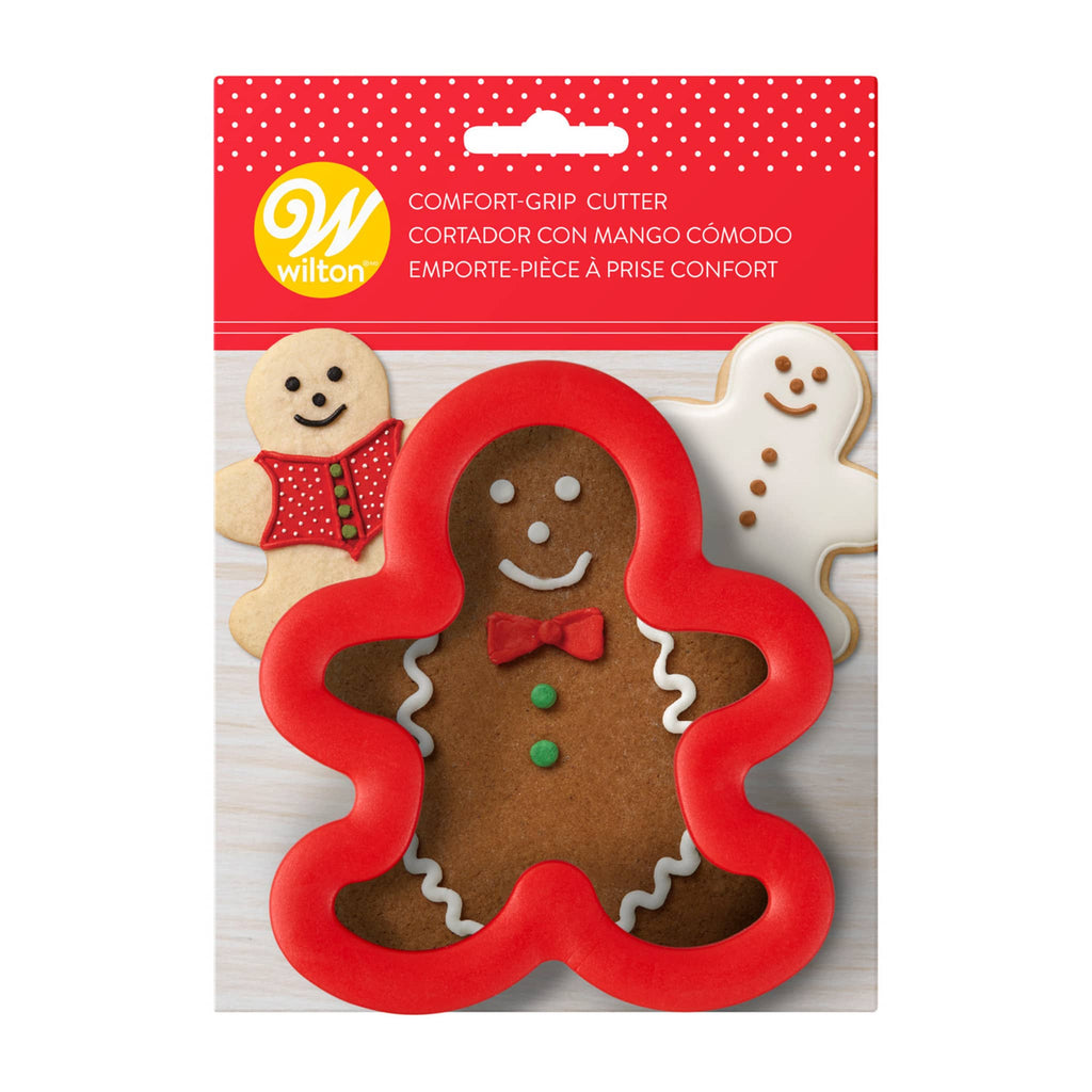 Wilton Gingerbread Man heavy-duty red comfort-grip cookie cutter in packaging, front view.