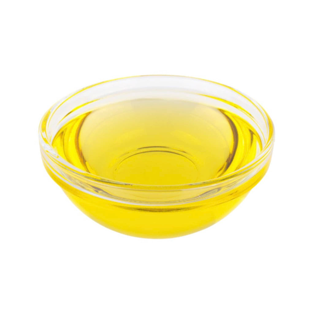 WOO World of Oils Organic Apricot Oil in glass dish.