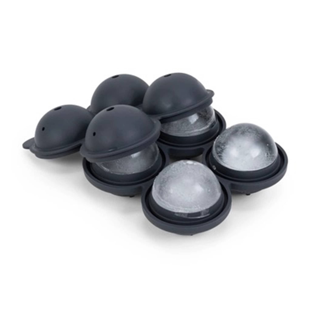 W&P Design Sphere Ice Tray Quad in charcoal gray, lid off showing prepared ice inside.