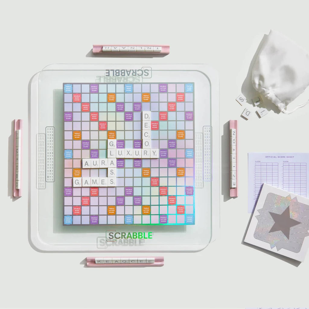WS Game Company Scrabble classic crossword game, Aura edition, overhead view in play with contents.