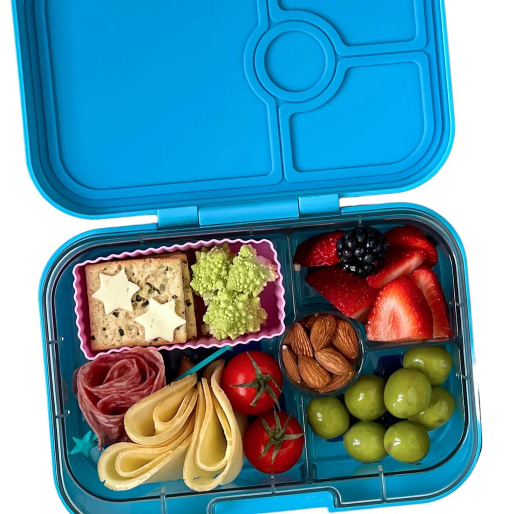 yumbox panino 4 compartment leakproof kids bento box in luna aqua case with zodiac tray, lid open, with food.