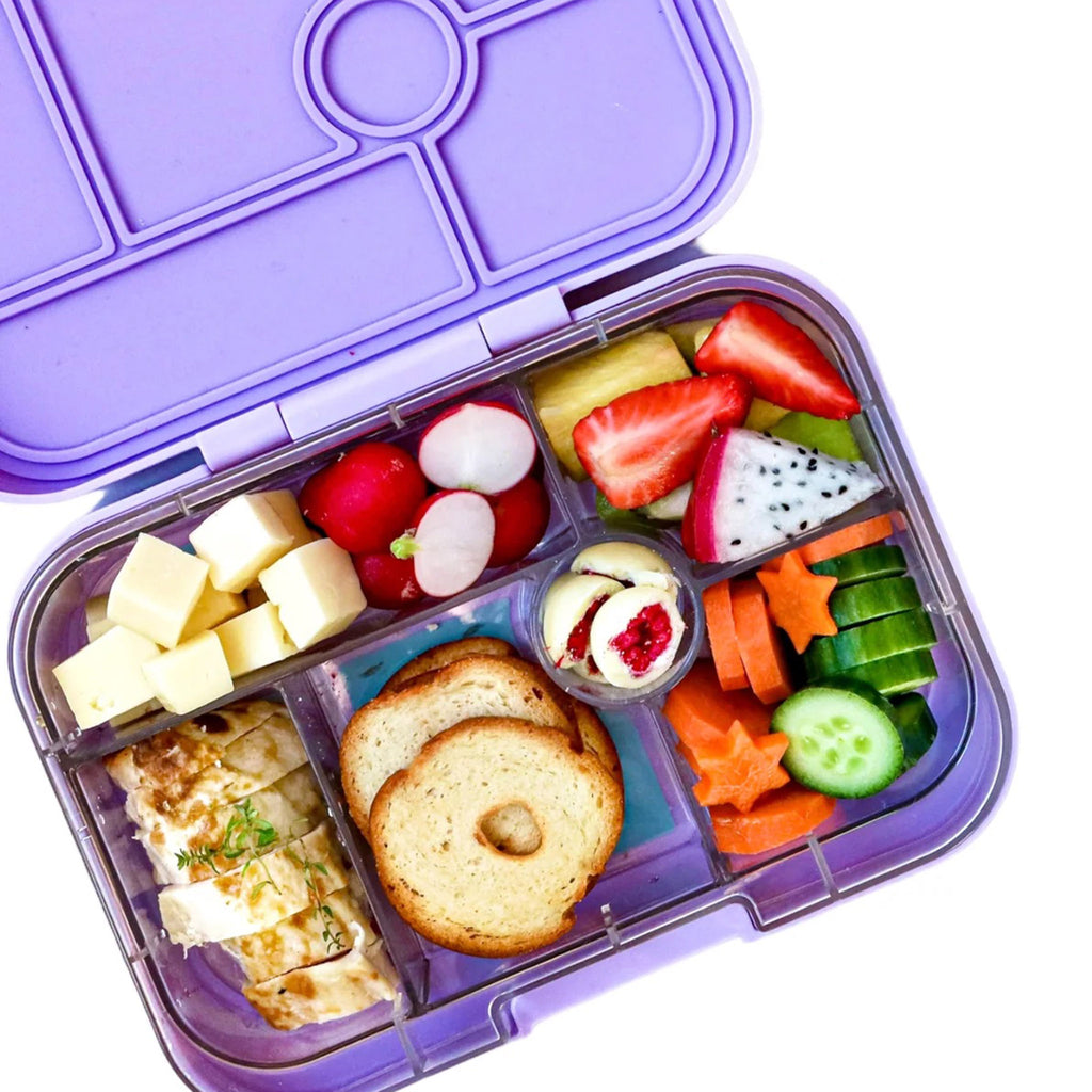 yumbox 6 compartment leakproof kids bento box in lulu purple case with paris tray, lid open, with food.