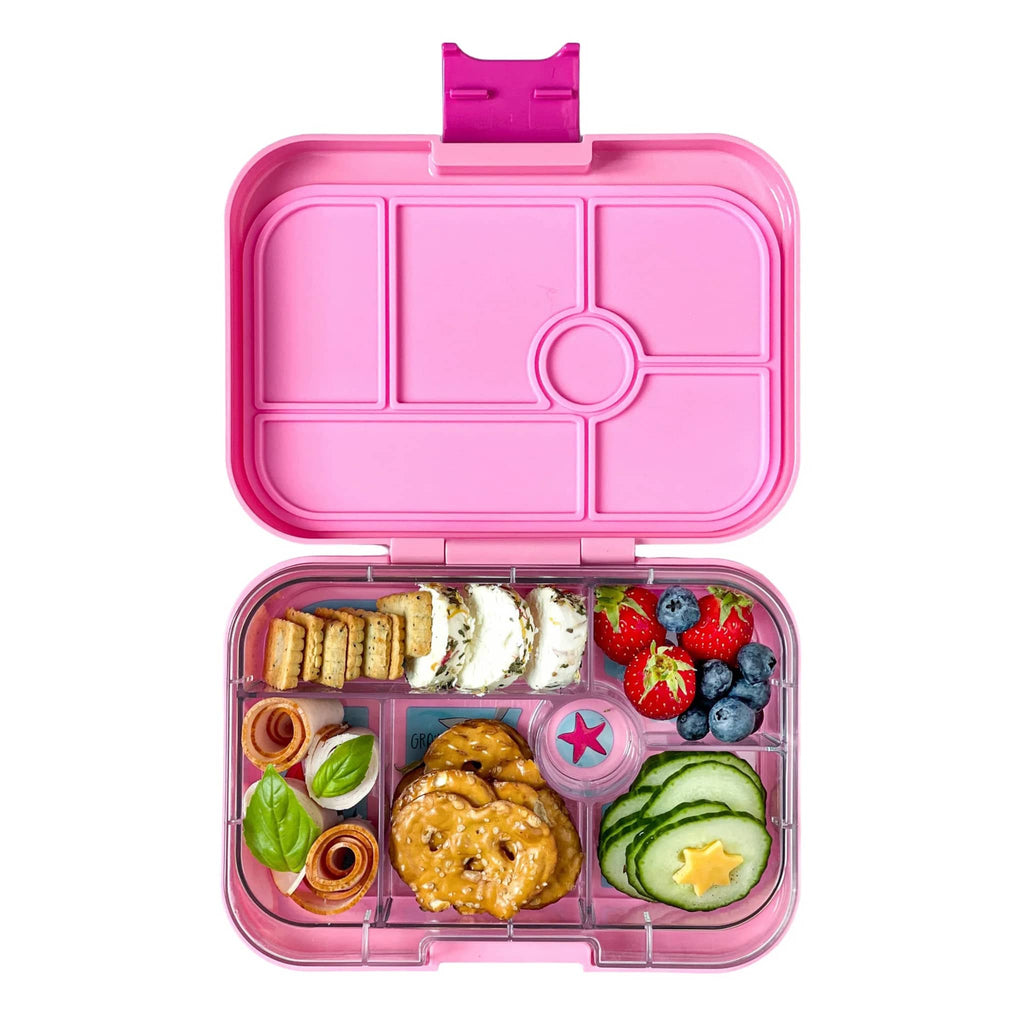 Yumbox 6 compartment leakproof kids bento box in power pink case with mermaid illustrated tray, lid open with food.