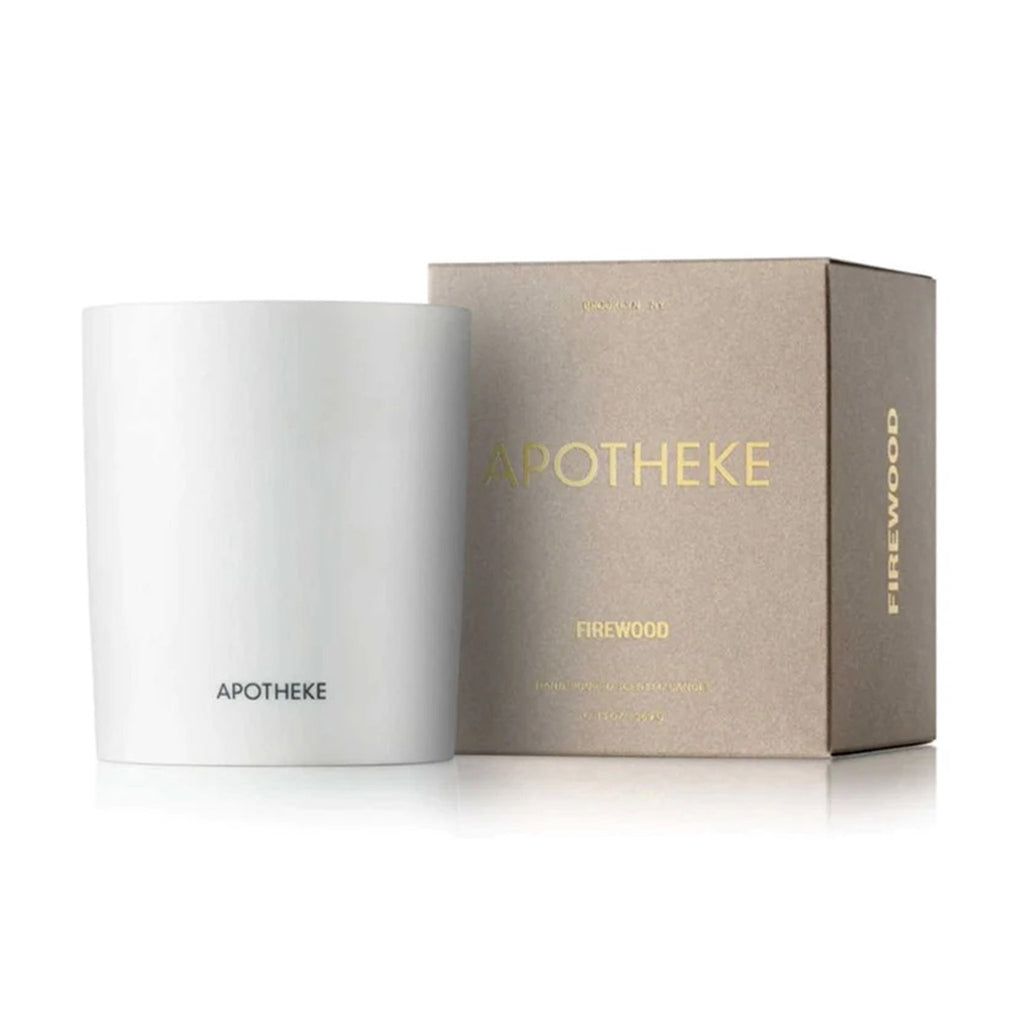 Apotheke Firewood limited edition winter collection scented soy wax candle in white ceramic vessel with beige gift box.