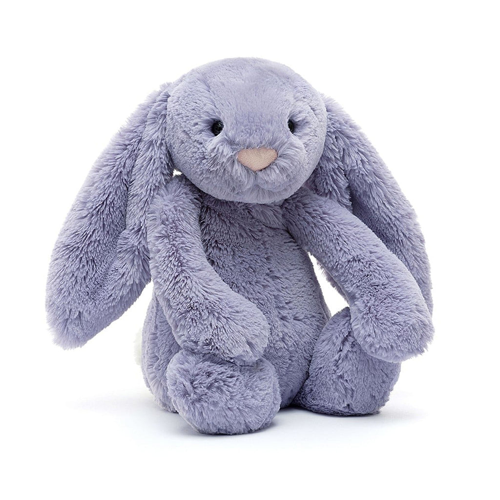 Jellycat Medium Bashful Viola Bunny plush toy with light purple fur, a pink nose and black bead eyes in sitting position, front view.