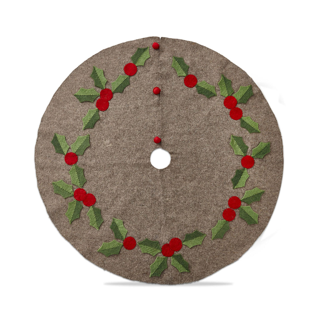 Tag Ltd Holly Leaf Tree Skirt with felt red berries and 2 tone green leaves on a brown wool backdrop.