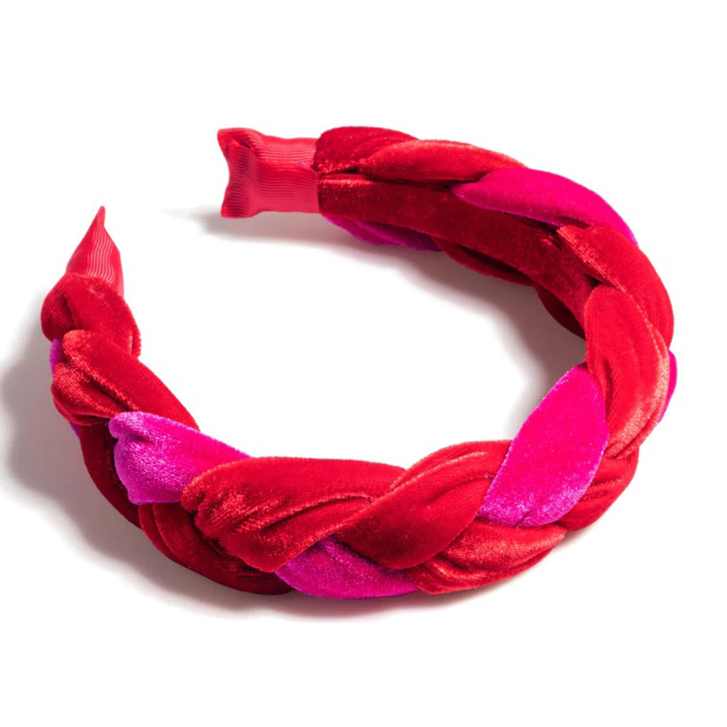 Shiraleah magenta and pink velveteen braided headband, laying down on a white background.