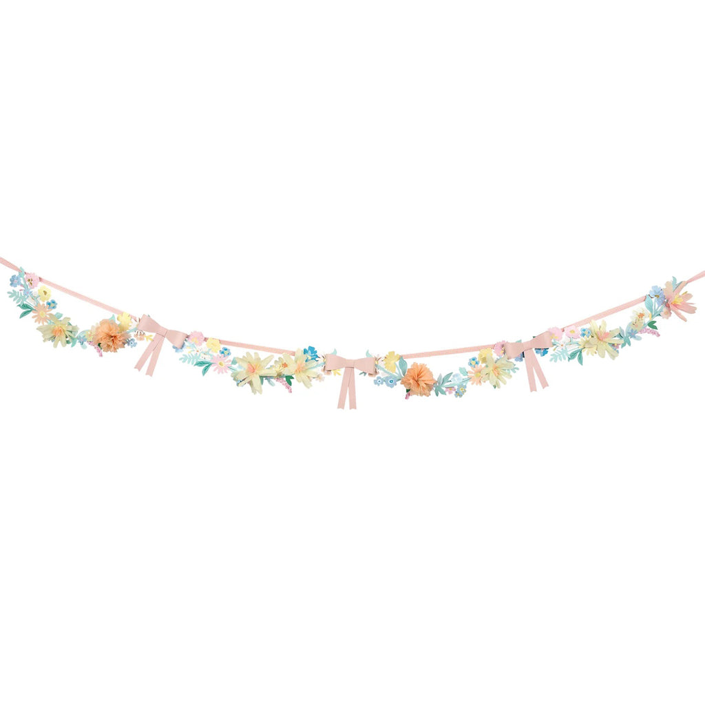 Meri Meri Flower and Bow Garland party decoration stretched out to see full length.