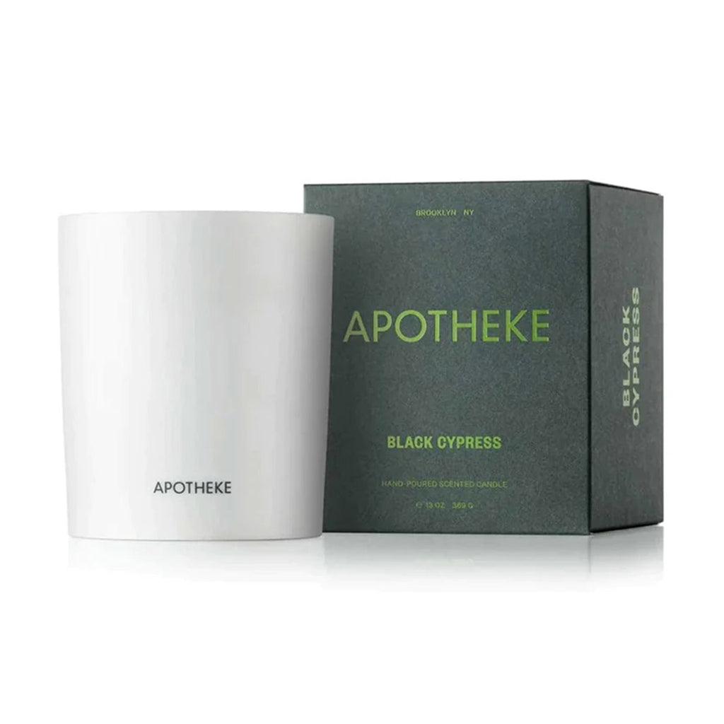 Apotheke Black Cypress limited edition winter collection scented soy wax candle in white ceramic vessel with dark green gift box.