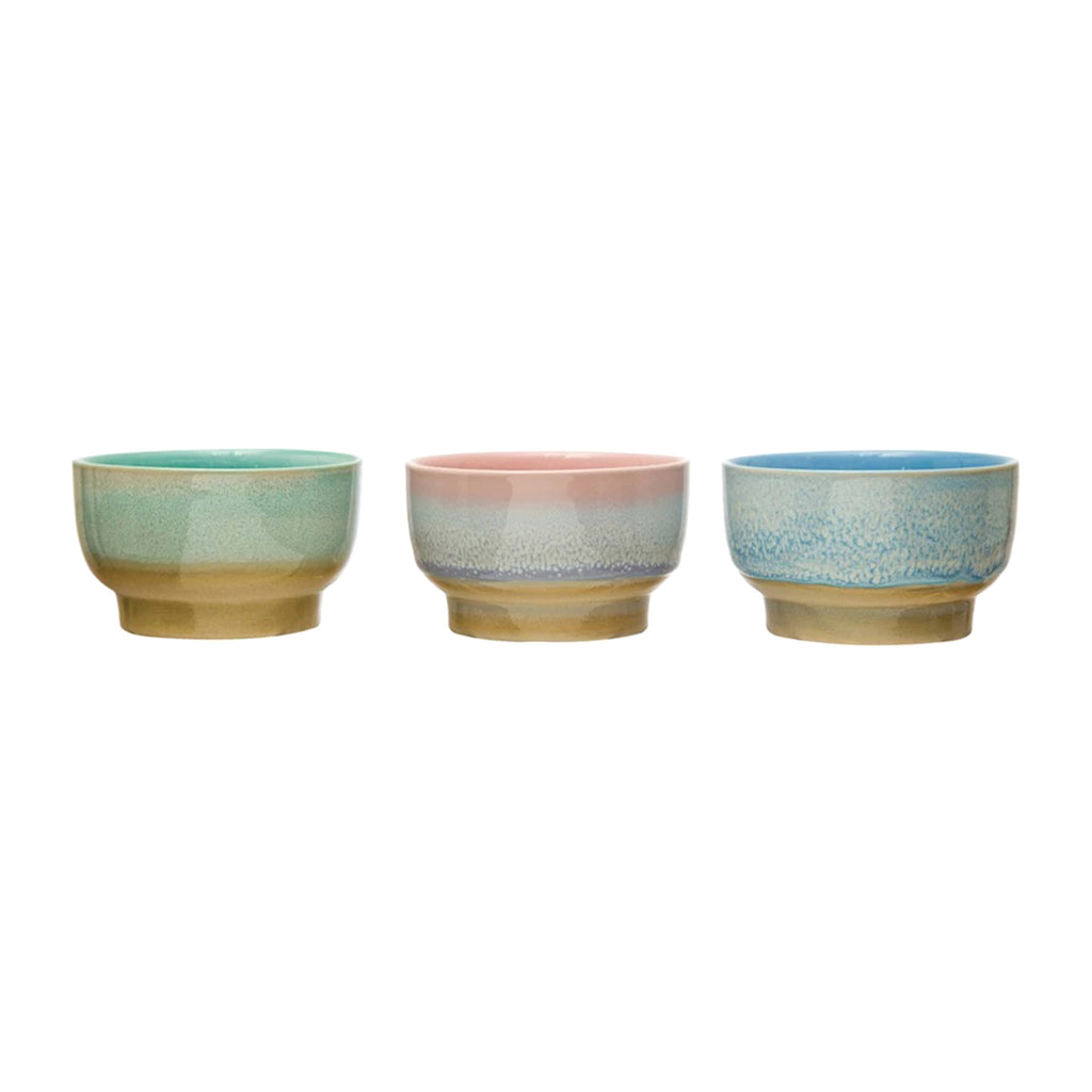 Bloomingville footed stoneware bowls with pastel reactive glaze in (left to right): green, pink and blue.
