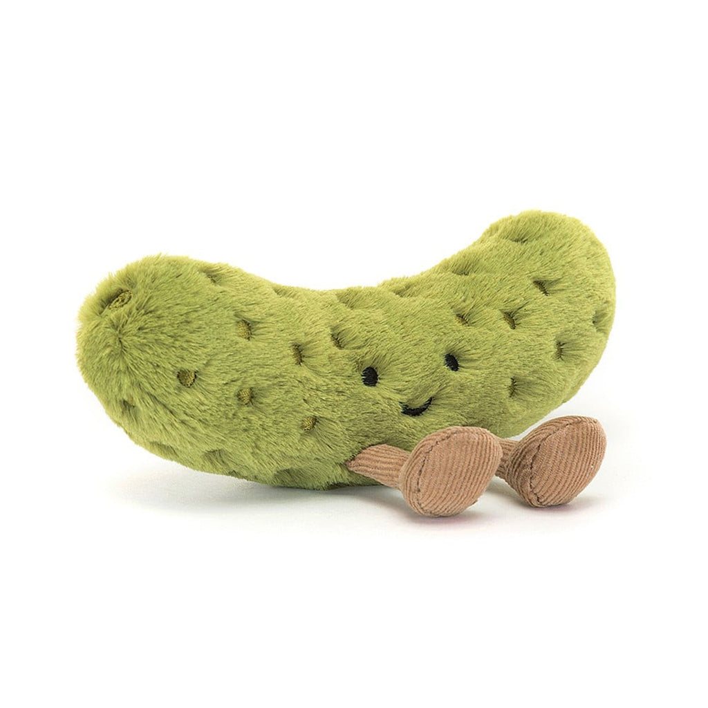 Jellycat Amuseable Pickle plush toy with green fur, black bead eyes, stitched smile and brown corduroy feet, front view.