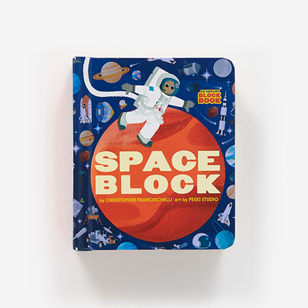 Cover of Spaceblock baby board book with an astronaut in suit walking on an orange planet with iconic space graphics all around on a dark blue background.