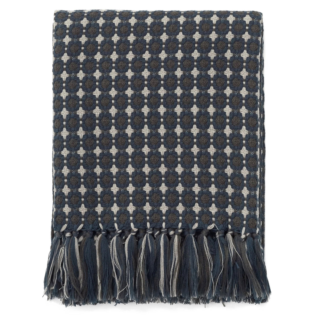 ADV Chester Woven Throw with a knitted and knotted geometric pattern in shades of blue and gray.