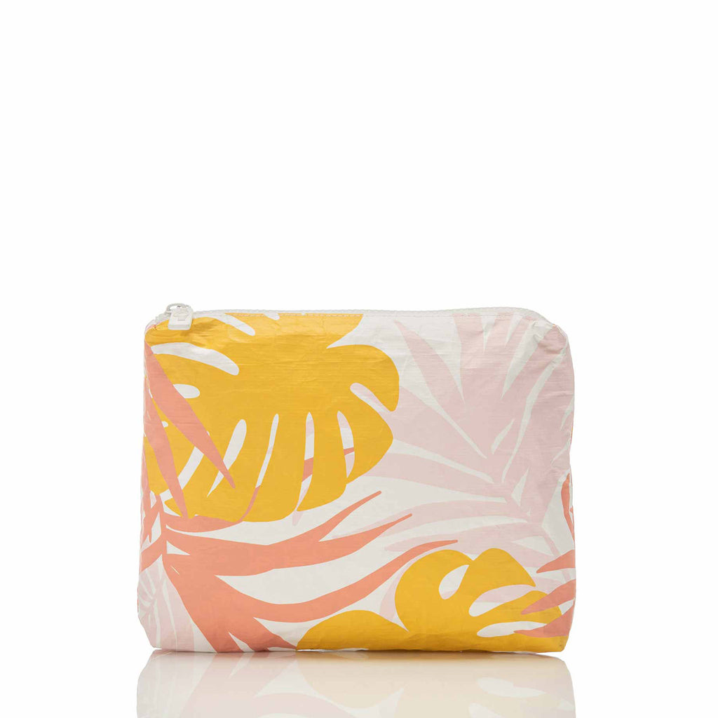 aloha collection small waterproof pouch in tropical leaf "tropics" pattern in yellow and pink, front view with white zipper