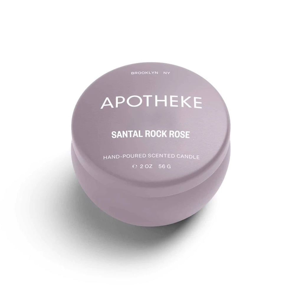 Apotheke Santal Rock Rose scented soy wax blend candle in mini pink tin with lid.