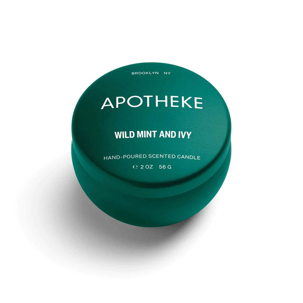 Apotheke Wild Mint and Ivy scented soy wax blend candle in mini dark green tin with lid.