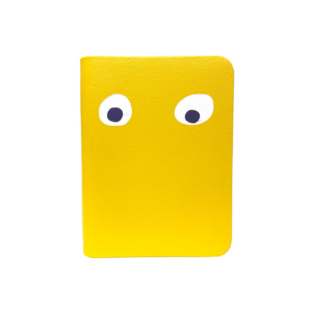 Ark Colour Design Googly Eye Mini Notebook with yellow leather cover, front view.