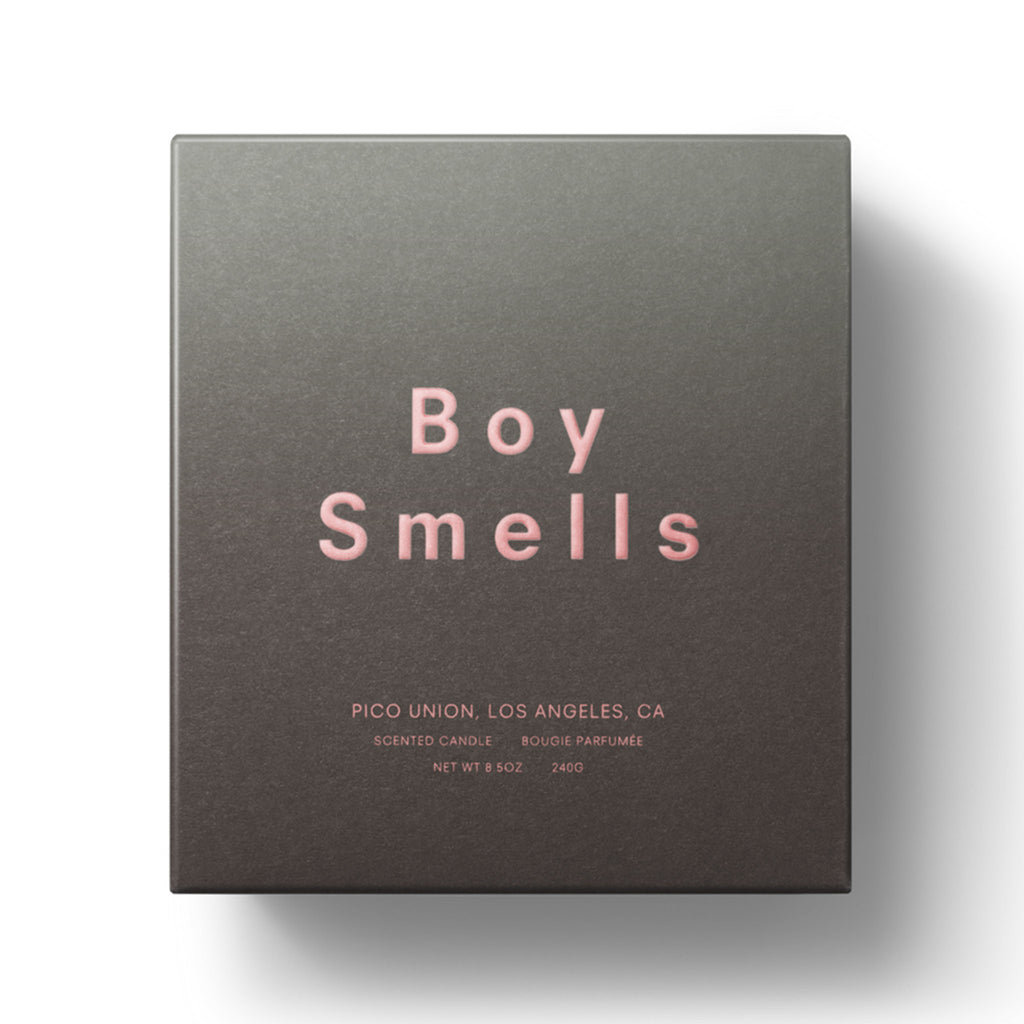 boy smells the fantome scented coconut beeswax blend candle in ombre green matte embossed gift box