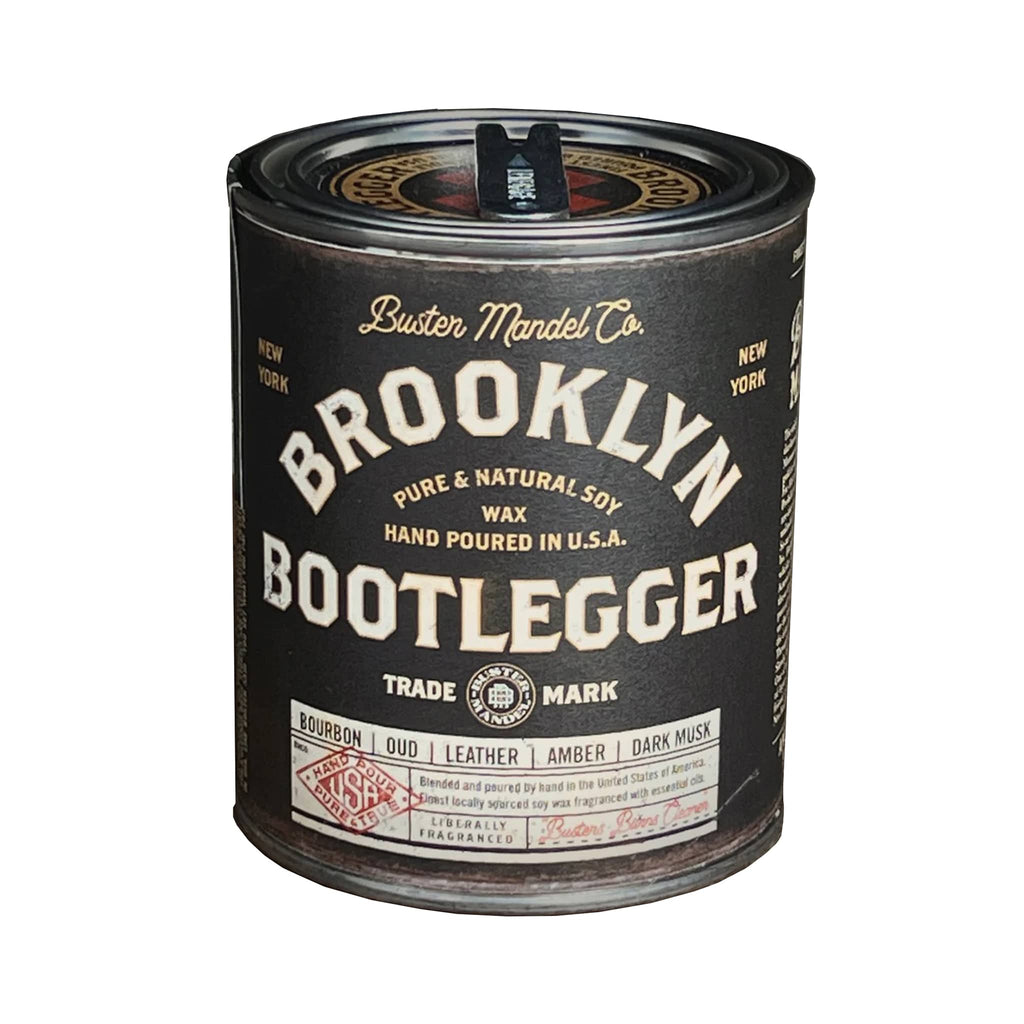Buster Mandel Co. Brooklyn Bootlegger scented soy wax candle in metal tin with lid and black label with vintage look.