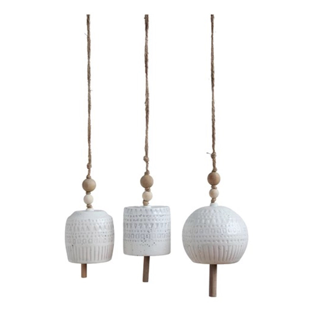 3 stoneware bells in slightly different shapes with white reactive glaze, a debossed pattern, jute hanging cord and 2 wooden beads.