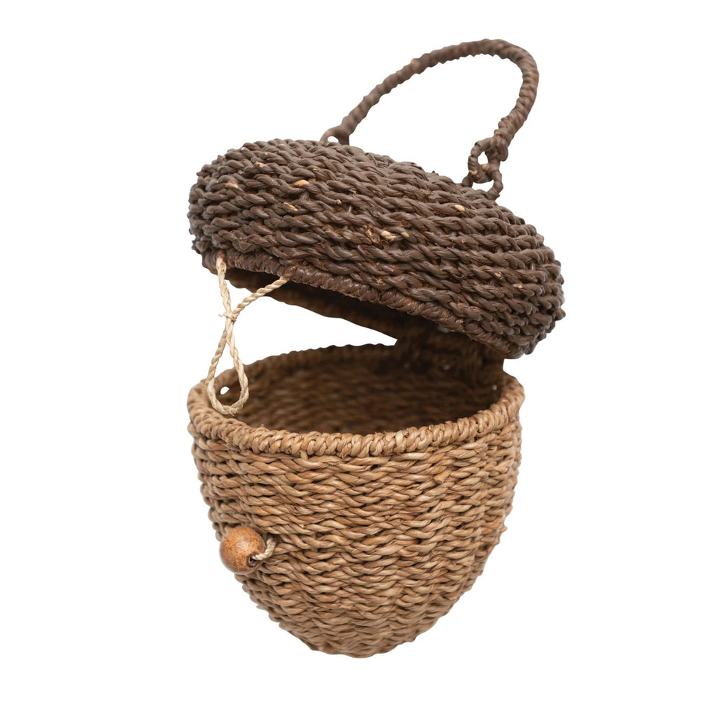 Bankuan woven basket shaped like an acorn with tan bottom and dark brown lid with handle, lid is open.
