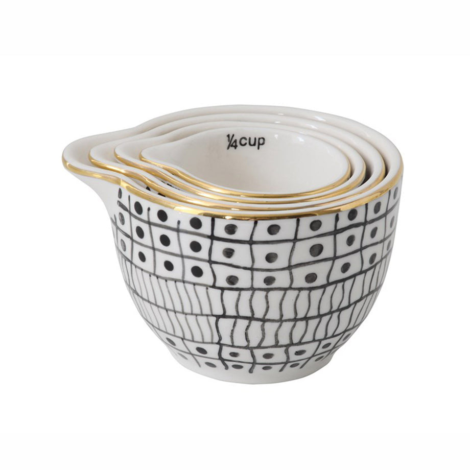 https://blueribbongeneralstore.com/cdn/shop/products/creative-coop-stoneware-measuring-cups-with-black-pattern-and-gold-electroplating-stacked_460x@2x.jpg?v=1583551548
