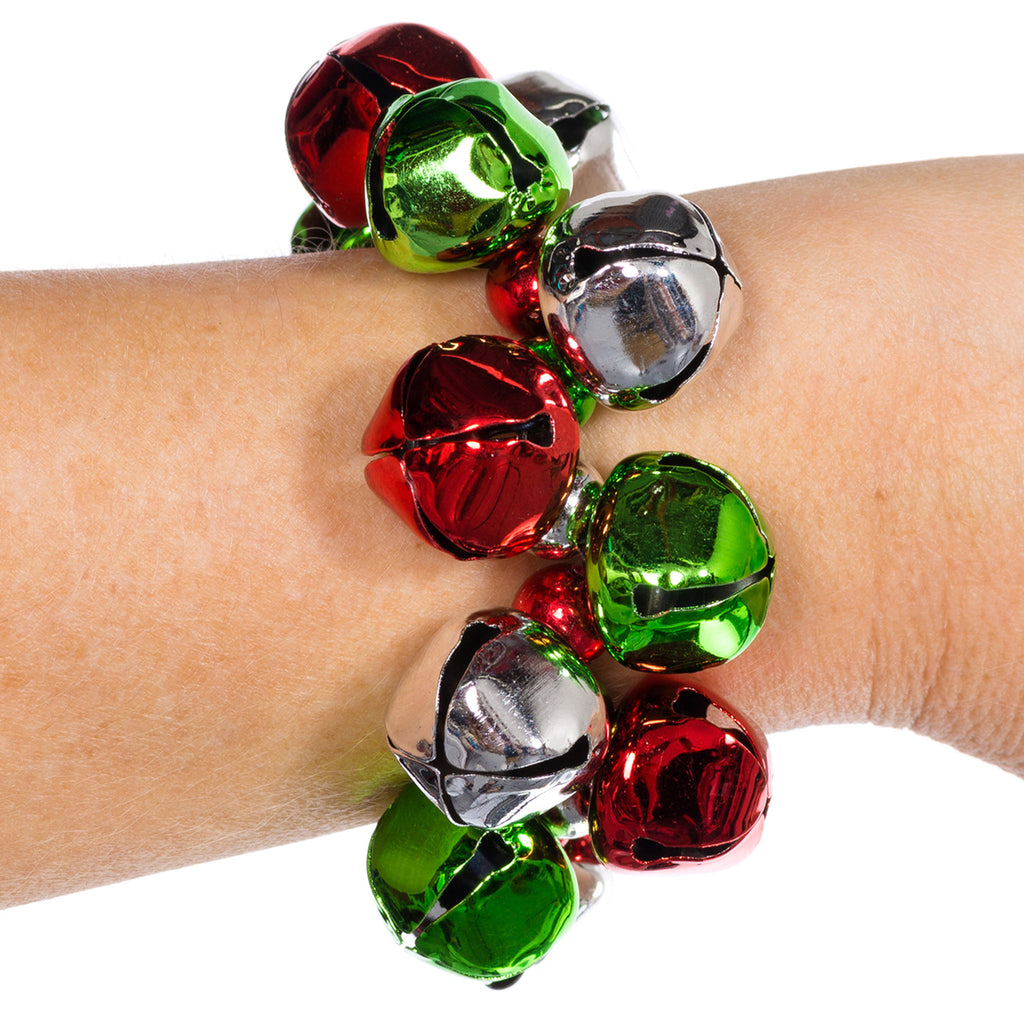 dm merchandising jingle bell jinglette festive stretch bracelet holiday christmas accessory in red, green, silver color way on wrist
