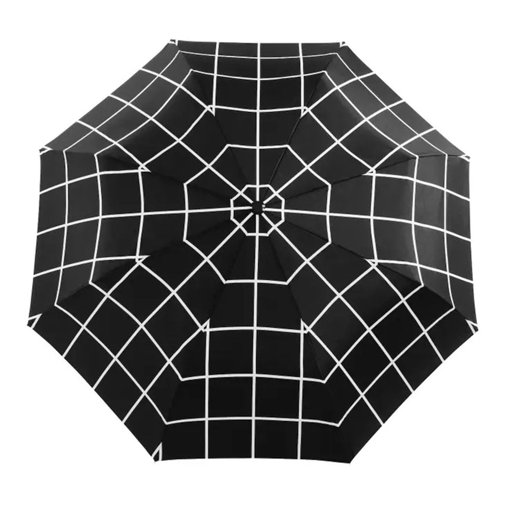 Original Duckhead compact, eco-friendly, wind resistant umbrella in a black & white grid pattern, overhead view of open canopy.