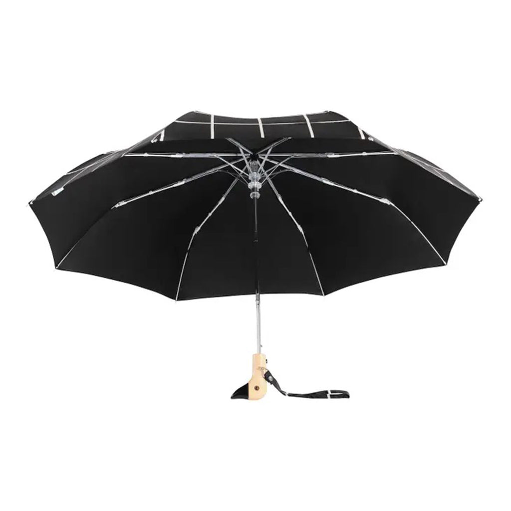 Original Duckhead compact, eco-friendly, wind resistant umbrella in a black & white grid pattern, side view of opened umbrella.