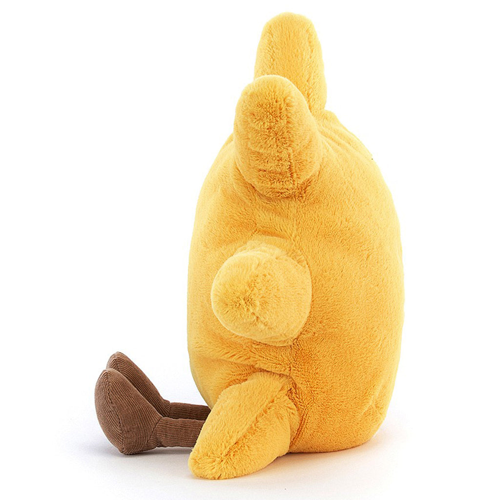 jellycat large amuseable yellow fuzzy sun plush toy with rays, brown corduroy feet, black button eyes and a stitched smile side view