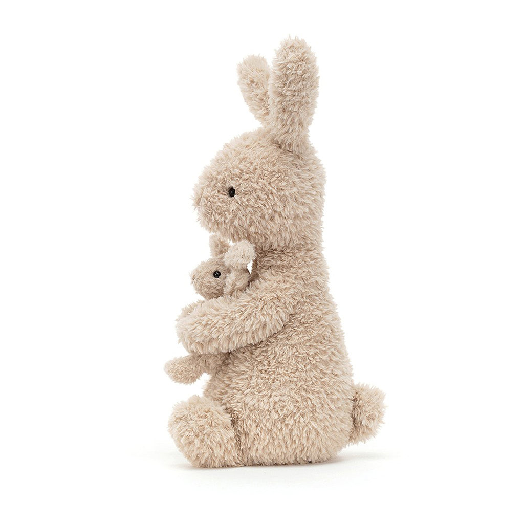 Jellycat Huddles Bunny plush toy, tan bunny holding a baby bunny in its arms, side view.