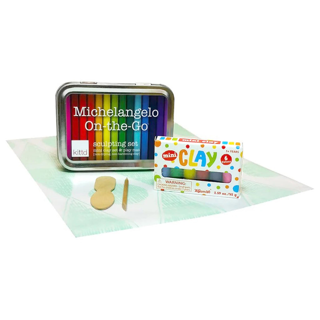 Michelangelo On-the-Go Sculpting Set with mini clay set, play mat and wood sculpting tools all in a travel size silver tin.