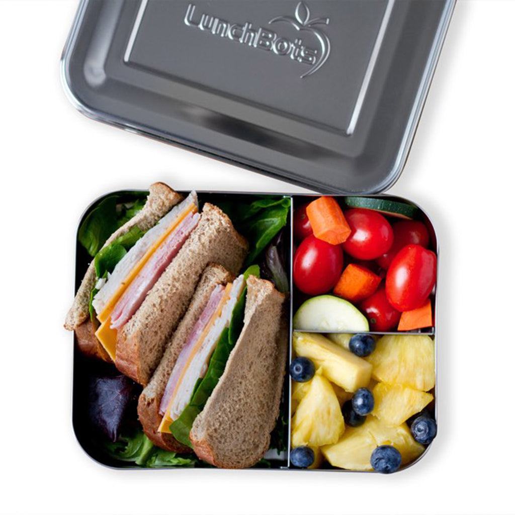 lunchbots large trio stainless steel bento box lunchbox lid open with sandwich, fruit and veggies