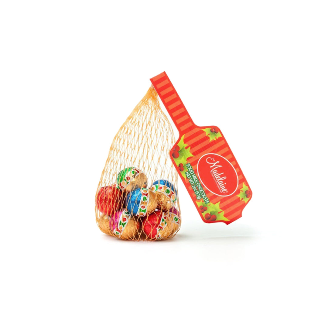 Solid milk chocolate balls, wrapped in colorful foil to look like ornaments, in an orange mesh bag with red tag.