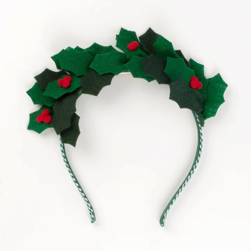 Green gingham ribbon headband with green felt holly leaves and red pompom holly berries attached. 