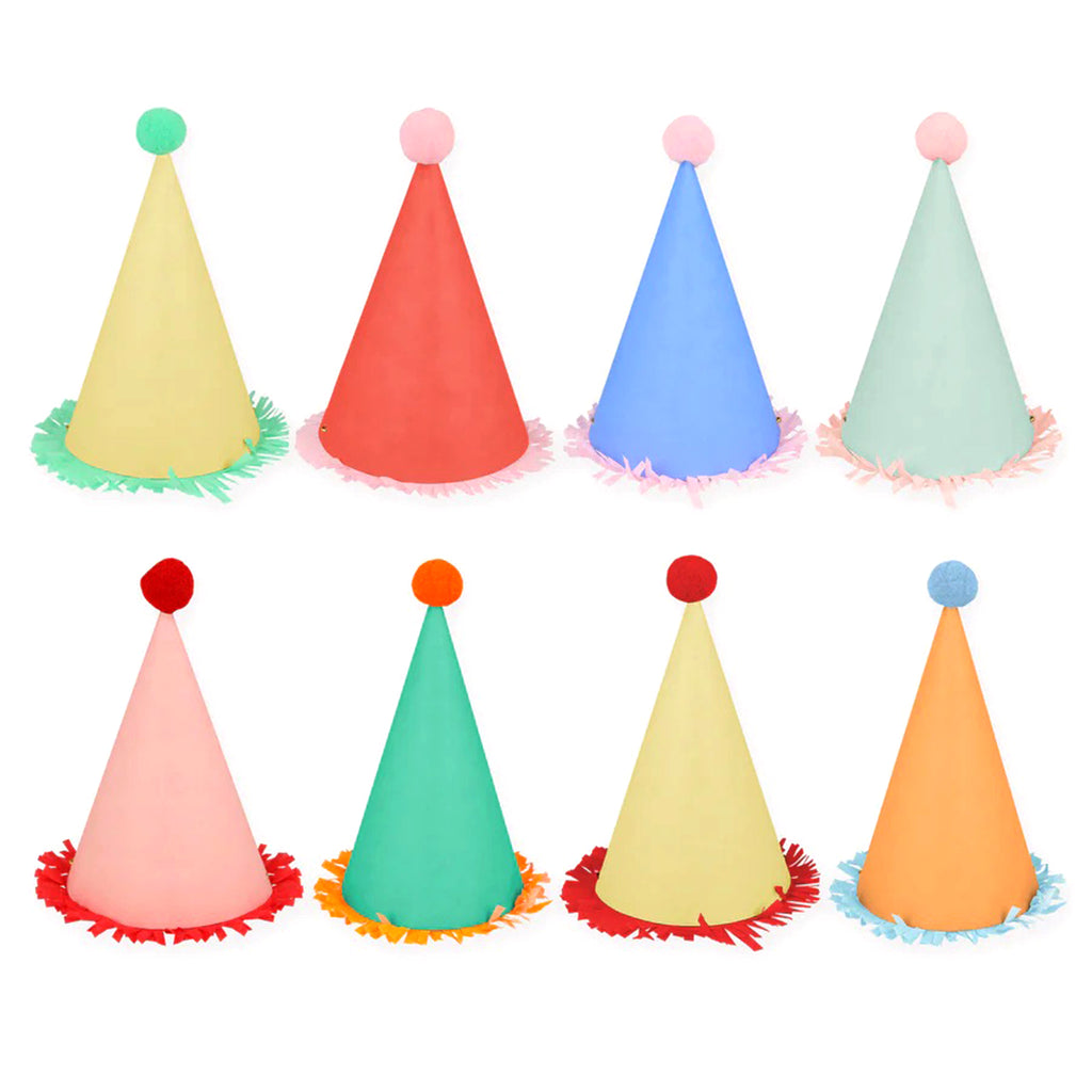 Meri Meri Large Party Hats in 8 bright colors with contrasting crepe paper fringe at the bottom and a colorful pompom on the top.