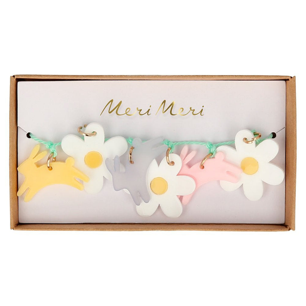 meri meri kids easter bracelet with enamel bunnies and daisies on a mint green waxed cord in packaging