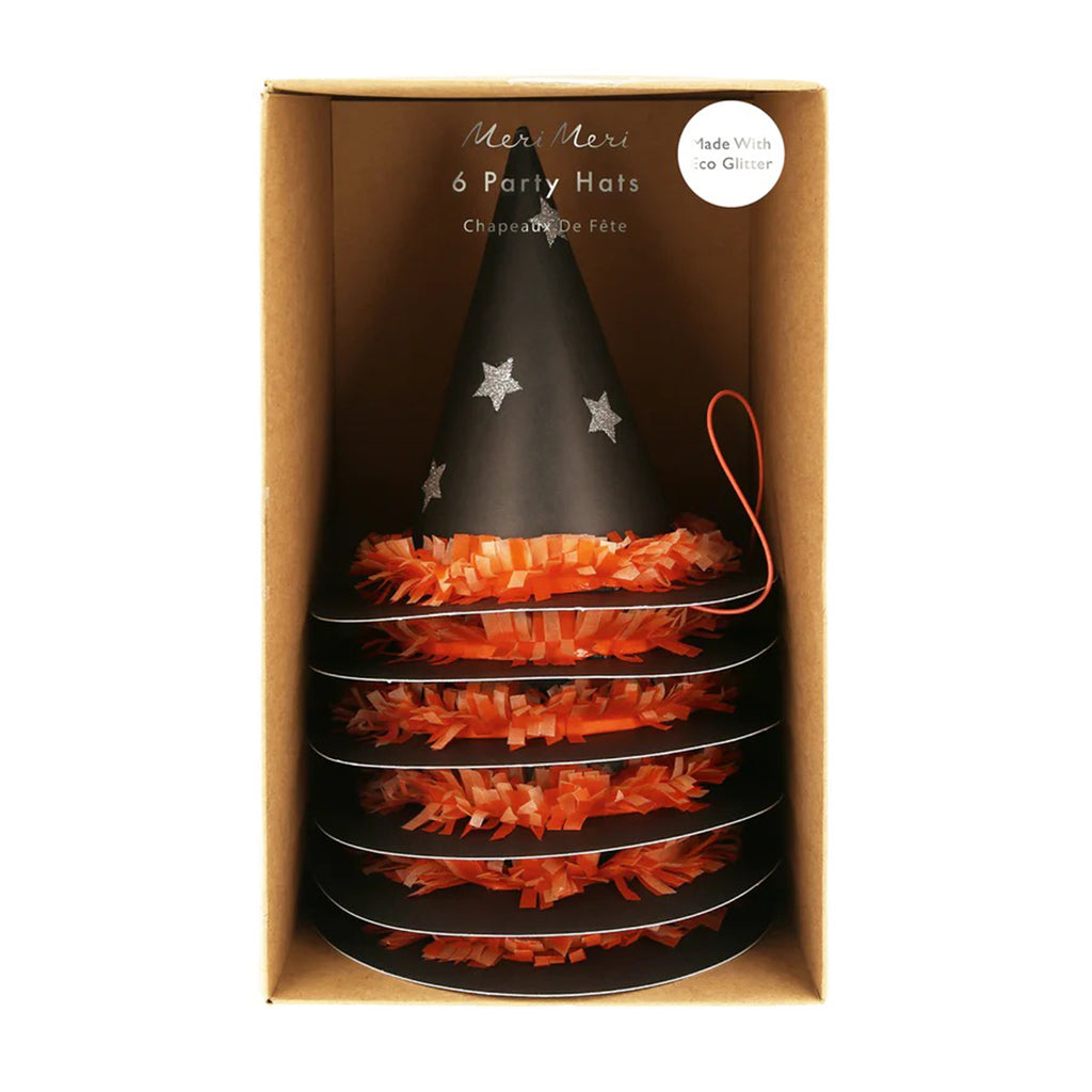 Mini black witch party hats with silver stars and orange crepe paper ruffles in packaging.