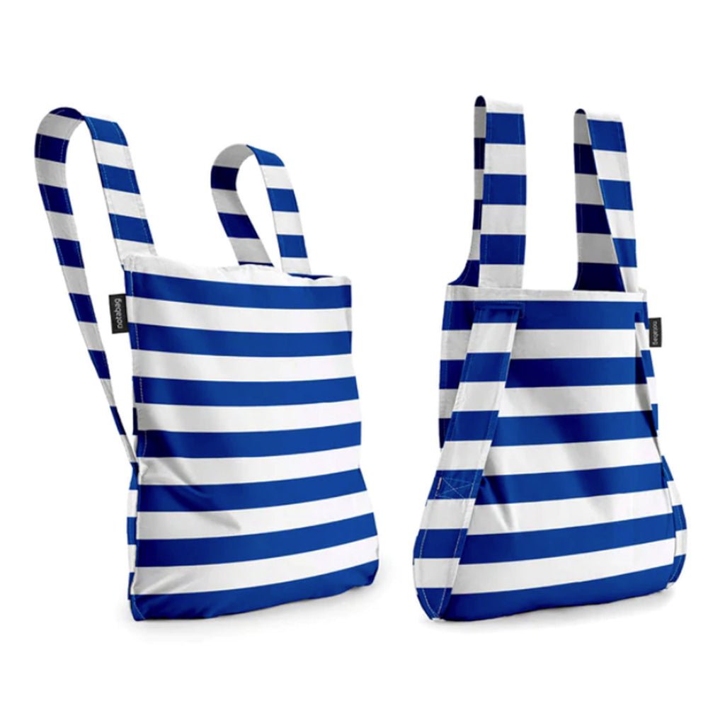 notabag reusable cotton and nylon bag that transforms from backpack to tote bag in marine stripes pattern with thick blue and white stripes