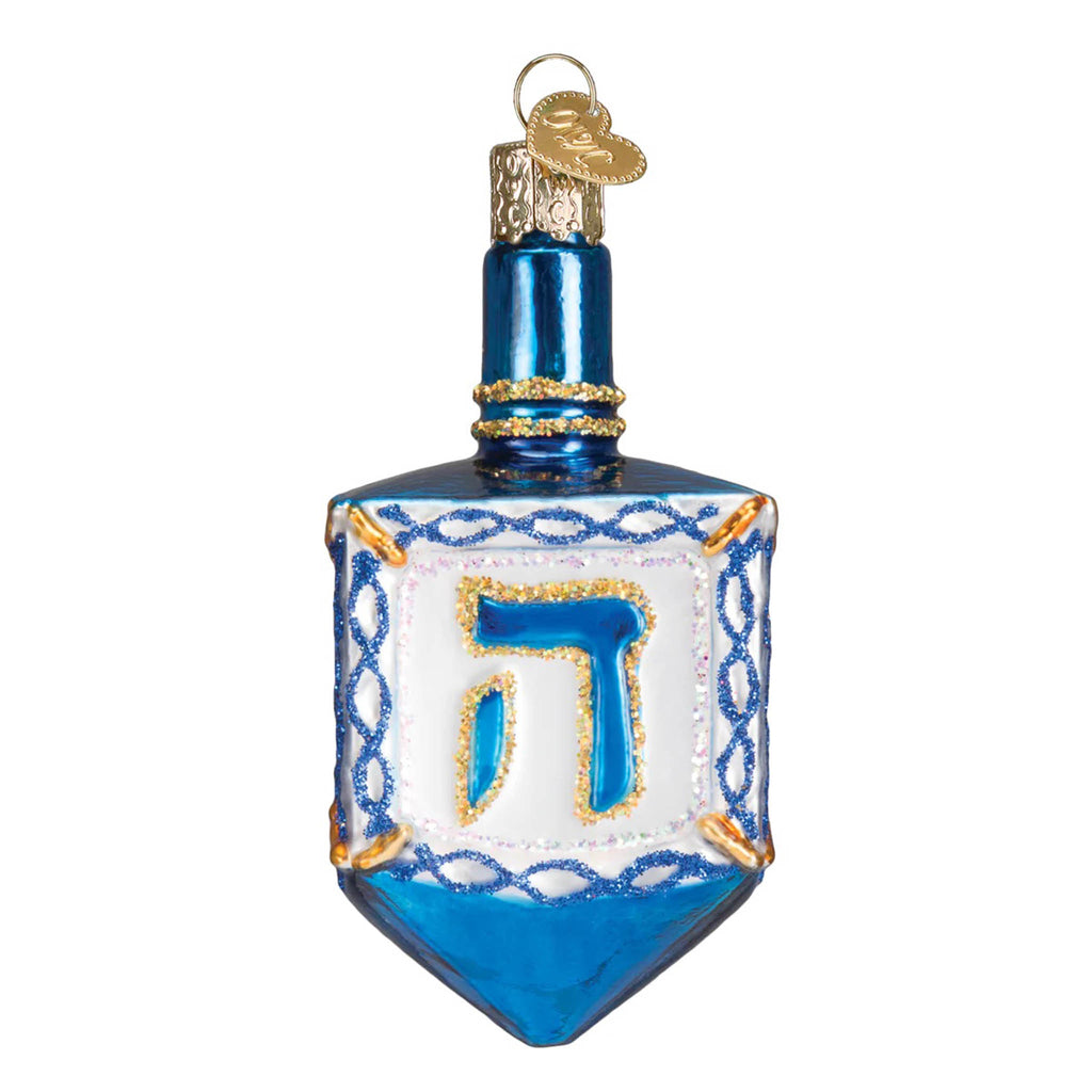 Side view of a blue and white glass dreidel shaped ornament with gold glitter accents.