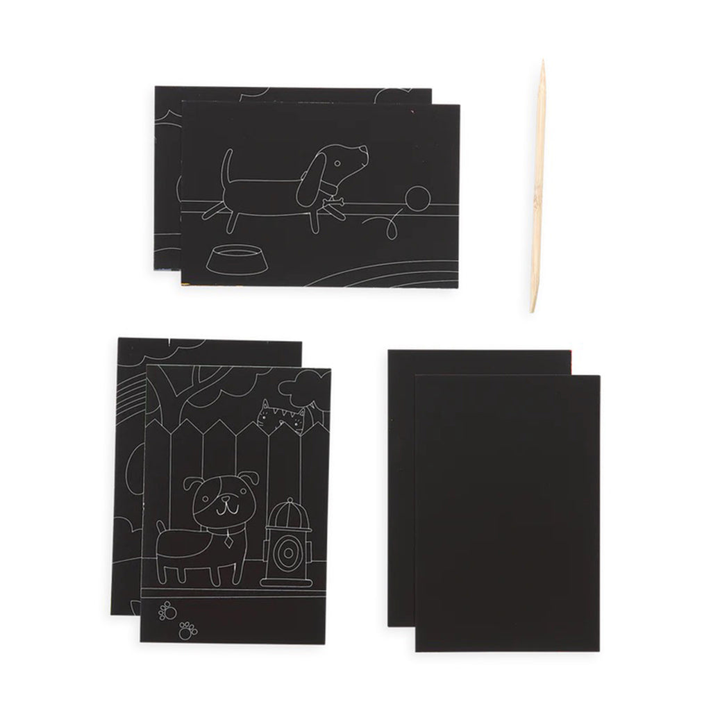 scratch & scribble mini kit playful pups guided artwork 4 black sheets of paper with dog illustrations and 2 blank black pages and a wood scratching tool 
