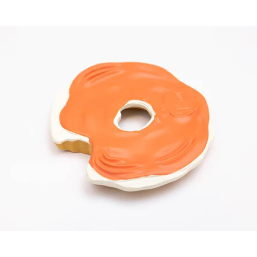 Everything bagel with lox and cream cheese shaped natural rubber baby teether bath toy bottom view.