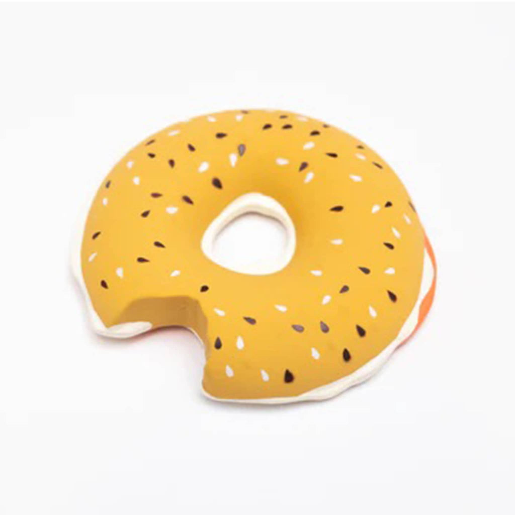 Everything bagel with lox and cream cheese shaped natural rubber baby teether bath toy top view.