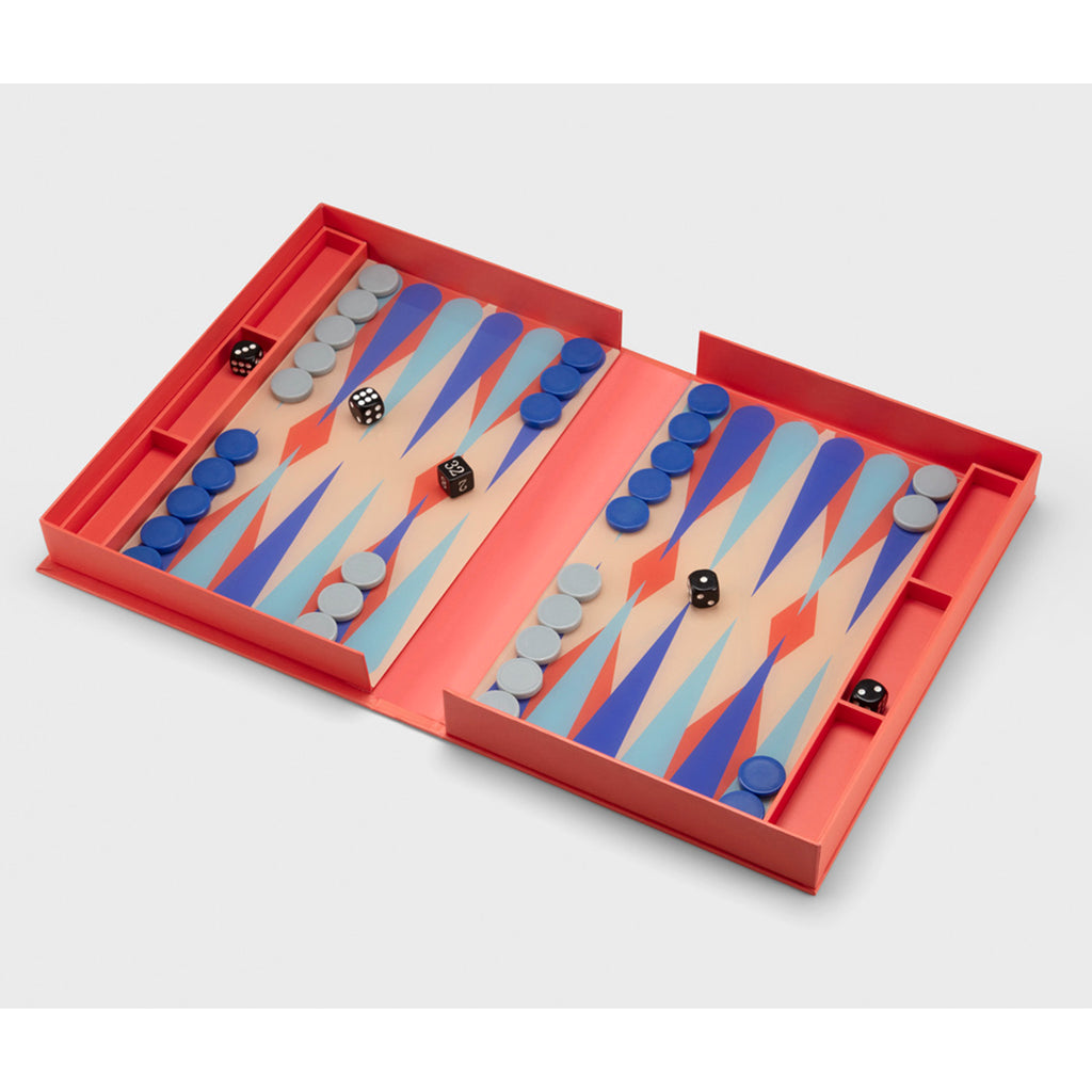 Printworks the art of backgammon board game open in bright orange box with dark blue and light blue pieces.