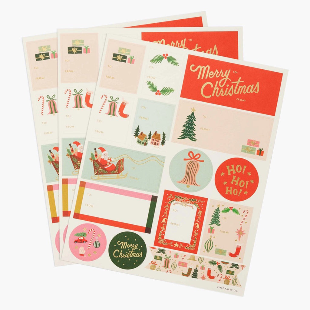 Set of 3 sheets of Christmas themed to and from gift tag stickers in red, green, pink and gold color scheme.