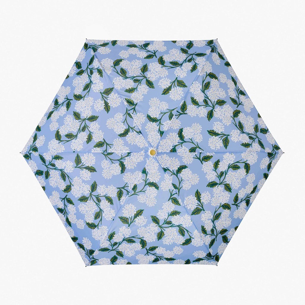 rifle paper company light blue umbrella with white hydrangeas and green leaves, open, top canopy view