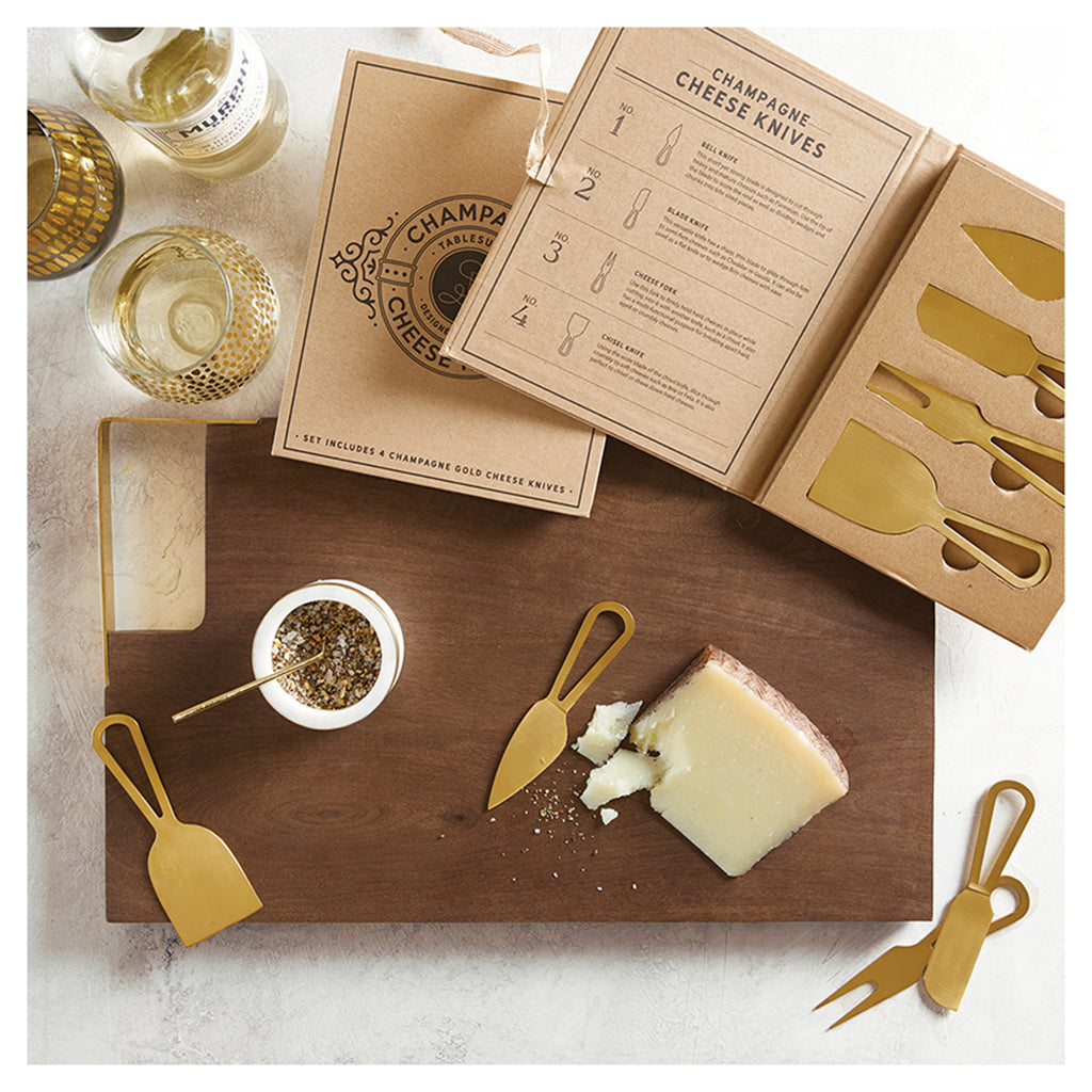 santa barbara design studio champagne gold stainless steel cheese knife set in entertaining setting